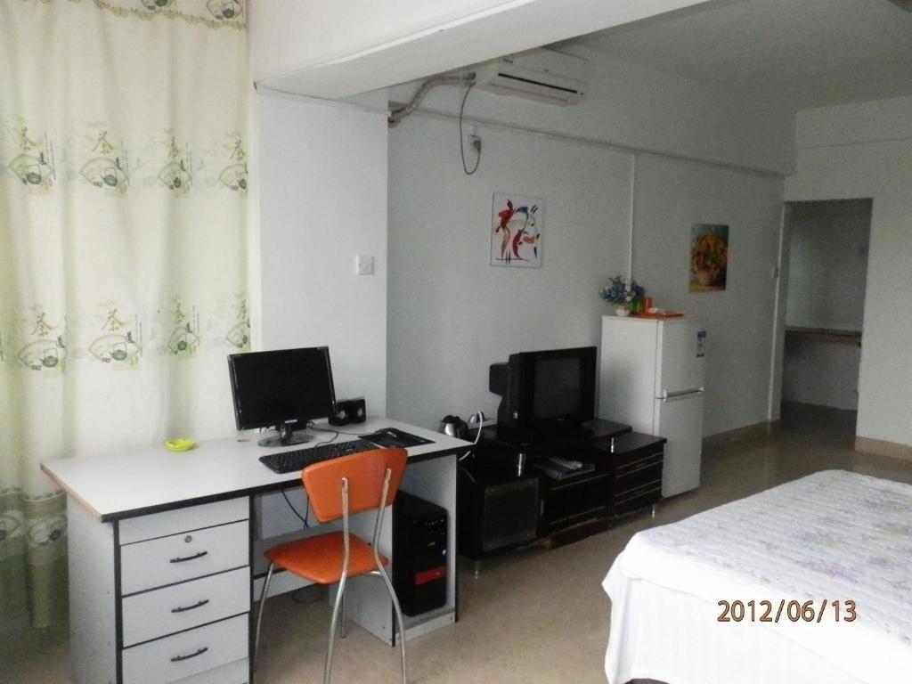 Xingfu Hotel Nanning Quarto foto