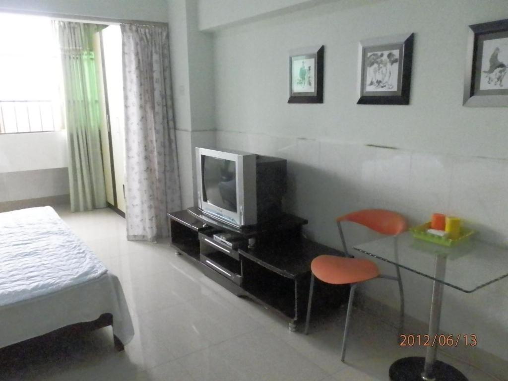 Xingfu Hotel Nanning Quarto foto