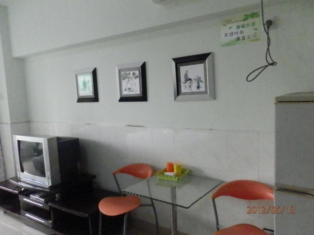 Xingfu Hotel Nanning Quarto foto