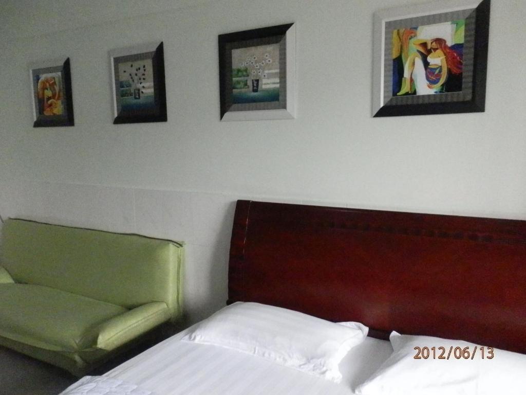 Xingfu Hotel Nanning Quarto foto