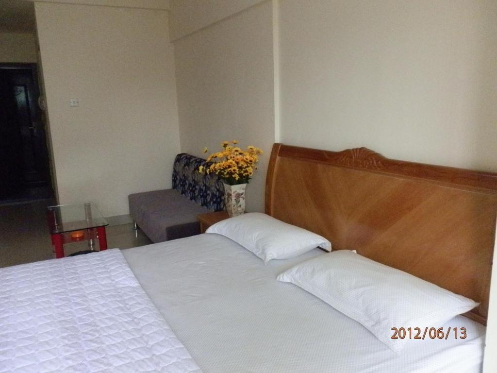 Xingfu Hotel Nanning Quarto foto